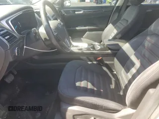 2016 Ford Fusion SE Hybrid z VIN 3FA6P0LU3GR173886, wystawiony jako Copart lot #60066015 z przebiegiem 140 328 mil mil oraz Szkoda całkowita • Salvage title. Historia ofert i sprzedaży dostępna na DreamBid. Obrazek 7.