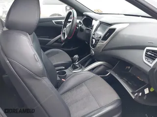 2016 Hyundai Veloster with VIN KMHTC6ADXGU273034, listed as a IAAI auction lot 40420771 with 206,694 mi miles. Bid and sale history available at carsss.com. Image 5.