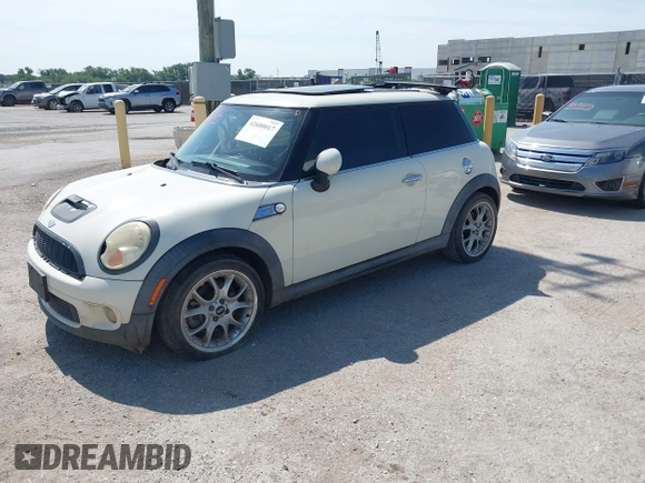 2007 MINI Hardtop S with VIN WMWMF73517TL83792, listed as a IAAI auction lot 42680017 with 135,631 mi miles and . Bid and sale history available at DreamBid. Image 2.