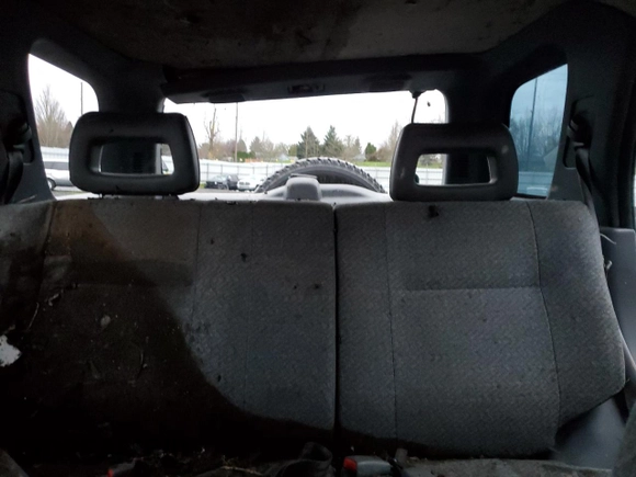 1998 Isuzu Rodeo S z VIN 4S2CM58W5W4350575, wystawiony jako Copart lot #84537714 z przebiegiem 215 573 mil mil oraz Szkoda całkowita • Salvage title. Historia ofert i sprzedaży dostępna na DreamBid. Obrazek 10.