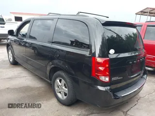 2013 Dodge Grand Caravan SXT with VIN 2C4RDGCG0DR552784, listed as a IAAI auction lot 42116395 with 96,917 mi miles and . Bid and sale history available at DreamBid. Image 3.