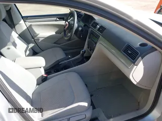 2014 Volkswagen Passat Wolfsburg Edition with VIN 1VWAT7A30EC084532, listed as a IAAI auction lot 42301251 with 81,963 mi miles and . Bid and sale history available at DreamBid. Image 5.