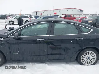 2016 Ford Fusion Energi SE Luxury with VIN 3FA6P0PU3GR166009, listed as a IAAI auction lot 41626623 with 133,596 mi miles. Bid and sale history available at carsss.com. Image 15.