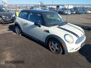 2010 MINI Hardtop with VIN WMWMF3C56ATZ23492, listed as a IAAI auction lot 41614452 with 132,744 mi miles and . Bid and sale history available at DreamBid. Image 1.