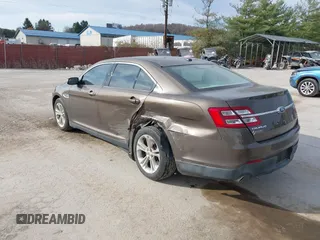 2015 Ford Taurus SEL with VIN 1FAHP2H87FG199865, listed as a IAAI auction lot 40760225 with 77,782 mi miles. Bid and sale history available at carsss.com. Image 3.