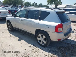2012 Jeep Compass Sport with VIN 1C4NJCBBXCD547891, listed as a IAAI auction lot 41971755 with 203,567 mi miles. Bid and sale history available at carsss.com. Image 3.