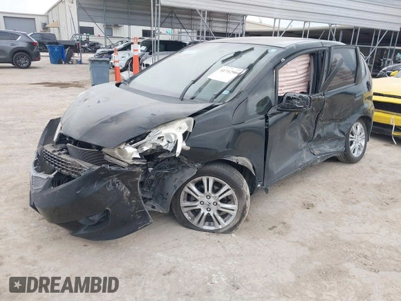 2009 Honda Fit Sport with VIN JHMGE88499S027610, listed as a IAAI auction lot 41712904 with 147,069 mi miles. Bid and sale history available at carsss.com. Image 17.