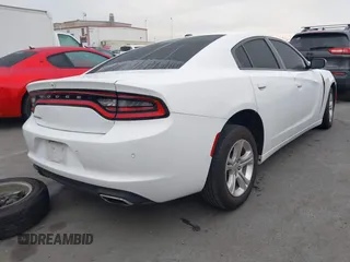 2021 Dodge Charger SXT with VIN 2C3CDXBGXMH514870, listed as a IAAI auction lot 41725294 with 72,962 mi miles. Bid and sale history available at carsss.com. Image 4.