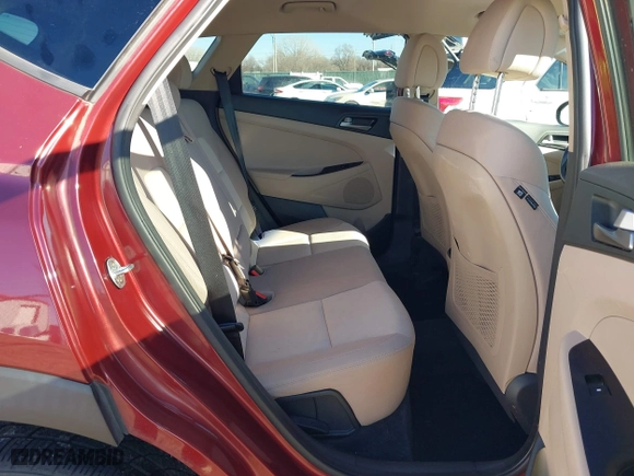 2017 Hyundai Tucson Value with VIN KM8J33A23HU349750, listed as a IAAI auction lot 41456946 with 134,285 mi miles. Bid and sale history available at carsss.com. Image 8.