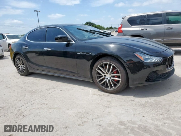 2014 Maserati Ghibli S Q4 with VIN ZAM57RTA8E1097777, listed as a Copart auction lot 59604665 with 86,135 mi miles and Salvage title. Bid and sale history available at DreamBid. Image 4.
