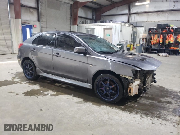 2011 Mitsubishi Lancer with VIN JA32Y6HVXBU601253, listed as a Copart auction lot 79090934 with 147,823 mi miles and Salvage Title. Bid and sale history available at DreamBid. Image 4.