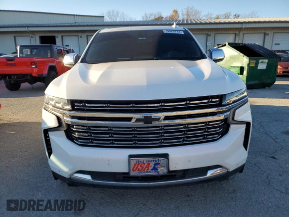 2022 Chevrolet Suburban Premier with VIN 1GNSKFKT7NR242288, listed as a Copart auction lot 79420734 with 77,006 mi miles and Salvage Title. Bid and sale history available at DreamBid. Image 5.