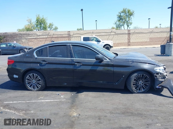2018 BMW 5 Series 530e with VIN WBAJA9C50JB249995, listed as a IAAI auction lot 42301414 with 179,673 mi miles and . Bid and sale history available at DreamBid. Image 14.