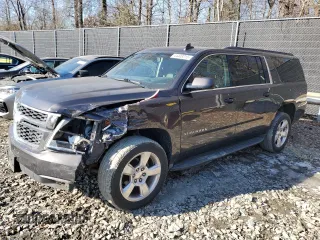 2016 Chevrolet Suburban LT with VIN 1GNSKHKC3GR430434, listed as a Copart auction lot 44408215 with 304,773 mi miles and Salvage Title. Bid and sale history available at DreamBid. Image 1.