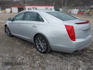 2013 Cadillac XTS Luxury with VIN 2G61P5S3XD9182910, listed as a IAAI auction lot 41940764 with 21,610 mi miles and . Bid and sale history available at DreamBid. Image 3.