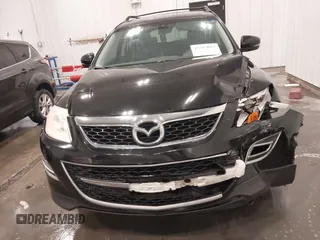 2011 Mazda CX-9 Grand Touring z VIN JM3TB3DA8B0329437, wystawiony jako IAAI lot #42243017 z przebiegiem 250 572 mil mil oraz . Historia ofert i sprzedaży dostępna na DreamBid. Obrazek 13.
