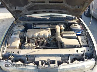 1996 Saturn SL with VIN 1G8ZF5289TZ265189, listed as a IAAI auction lot 41618552 with 264,742 mi miles. Bid and sale history available at carsss.com. Image 6.
