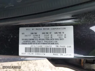 2014 Mazda Mazda6 i Touring with VIN JM1GJ1V68E1128650, listed as a IAAI auction lot 42035713 with 171,609 mi miles. Bid and sale history available at carsss.com. Image 9.