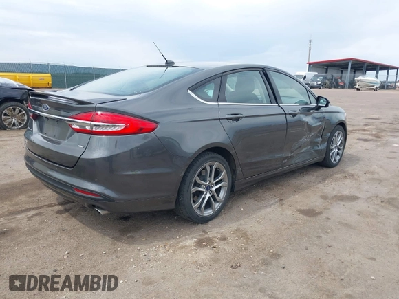 2017 Ford Fusion SE z VIN 3FA6P0H76HR354078, wystawiony jako IAAI lot #42103550 z przebiegiem 103 201 mil mil oraz . Historia ofert i sprzedaży dostępna na DreamBid. Obrazek 4.