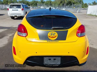 2013 Hyundai Veloster w/Gray Int with VIN KMHTC6AD8DU093272, listed as a IAAI auction lot 40407768 with 91,038 mi miles and . Bid and sale history available at DreamBid. Image 16.