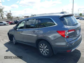 2021 Honda Pilot EX-L with VIN 5FNYF5H57MB046740, listed as a IAAI auction lot 41943366 with 31,198 mi miles and . Bid and sale history available at DreamBid. Image 15.