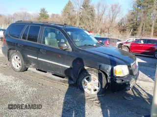 2004 GMC Envoy SLE with VIN 1GKDT13S742248322, listed as a IAAI auction lot 41275622 with 84,784 mi miles. Bid and sale history available at carsss.com. Image 1.
