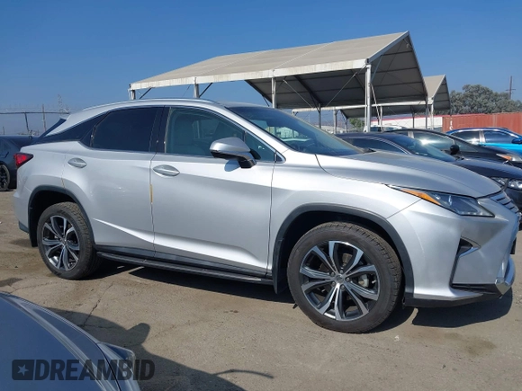 2017 Lexus RX 350 with VIN 2T2ZZMCA7HC061786, listed as a IAAI auction lot 42800283 with 31,300 mi miles and . Bid and sale history available at DreamBid. Image 13.