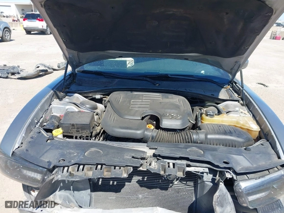 2014 Dodge Charger SE with VIN 2C3CDXBG1EH168709, listed as a IAAI auction lot 41872541 with 137,877 mi miles. Bid and sale history available at carsss.com. Image 10.