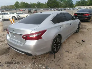 2018 Nissan Altima SR with VIN 1N4AL3AP8JC245501, listed as a IAAI auction lot 42026160 with 114,022 mi miles and . Bid and sale history available at carsss.com. Image 4.