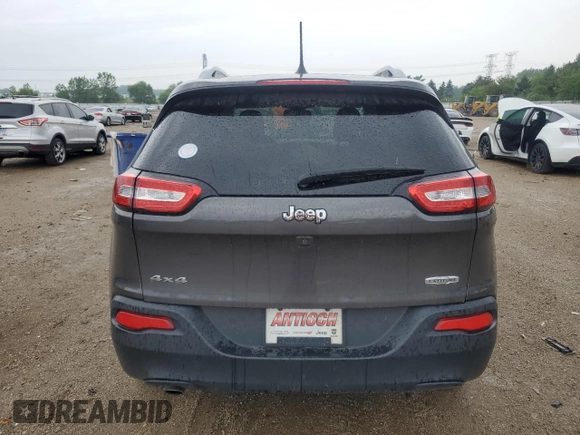 2016 Jeep Cherokee Altitude with VIN 1C4PJMCB2GW277417, listed as a Copart auction lot 61575165 with 125,396 mi miles and Salvage title. Bid and sale history available at DreamBid. Image 6.