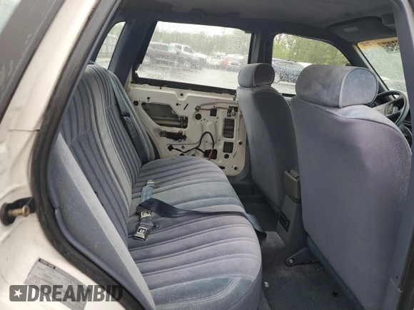 1992 Mercury Topaz GS z VIN 2MEPM36U1NB611321, wystawiony jako Copart lot #56950595 z przebiegiem 54 164 mil mil oraz Szkoda całkowita • Salvage title. Historia ofert i sprzedaży dostępna na DreamBid. Obrazek 10.