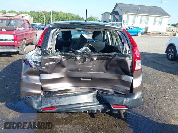 2013 Honda CR-V LX with VIN 3CZRM3H31DG703436, listed as a IAAI auction lot 42702584 with 140,013 mi miles and . Bid and sale history available at DreamBid. Image 6.