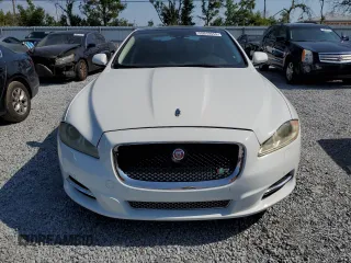 2015 Jaguar XJ with VIN SAJWA1CZ8F8V81637, listed as a Copart auction lot 55619555 with 88,328 mi miles and Salvage Title. Bid and sale history available at DreamBid. Image 5.