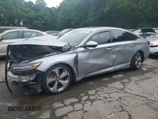 2020 Honda Accord Touring z VIN 1HGCV2F90LA031054, wystawiony jako Copart lot #55806185 z przebiegiem 76 678 mil mil oraz Szkoda całkowita • Salvage title. Historia ofert i sprzedaży dostępna na DreamBid. Obrazek 1.