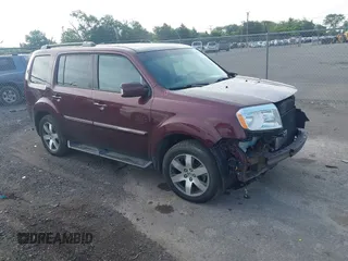 2013 Honda Pilot Touring with VIN 5FNYF4H98DB080439, listed as a IAAI auction lot 42733775 with 246,204 mi miles and . Bid and sale history available at DreamBid. Image 1.
