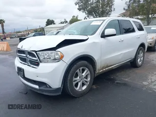 2013 Dodge Durango SXT z VIN 1C4RDHAG7DC694986, wystawiony jako IAAI lot #42181381 z przebiegiem 170 669 mil mil oraz . Historia ofert i sprzedaży dostępna na DreamBid. Obrazek 2.