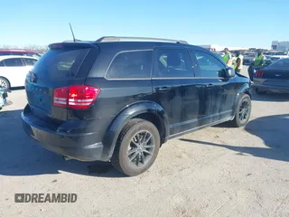 2020 Dodge Journey SE Value with VIN 3C4PDCAB7LT277627, listed as a IAAI auction lot 41729887 with 67,220 mi miles and . Bid and sale history available at carsss.com. Image 4.