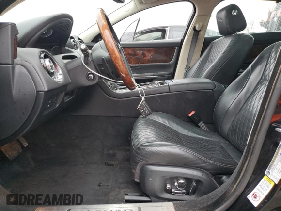 2016 Jaguar XJ Portfolio with VIN SAJWJ2GD8G8W02010, listed as a Copart auction lot 79011404 with Not Provided miles and Salvage Title. Bid and sale history available at DreamBid. Image 7.