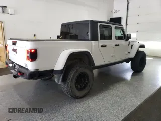 2020 Jeep Gladiator Rubicon with VIN 1C6JJTBG8LL121687, listed as a Copart auction lot 66404935 with 52,884 mi miles and Clean title. Bid and sale history available at DreamBid. Image 3.