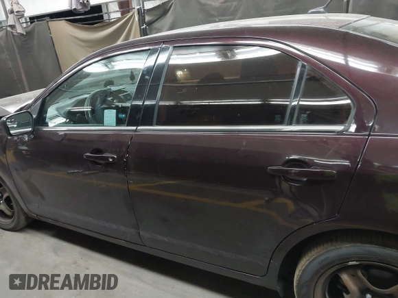 2011 Ford Fusion SE with VIN 3FAHP0HA3BR345933, listed as a IAAI auction lot 42008980 with 147,076 mi miles. Bid and sale history available at carsss.com. Image 14.