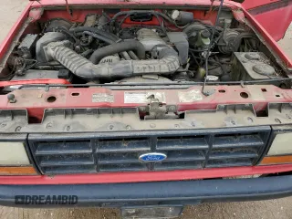 1992 Ford Ranger z VIN 1FTCR14U3NPA43414, wystawiony jako Copart lot #62961125 z przebiegiem 50 828 mil mil oraz Czysty tytuł • Clean title. Historia ofert i sprzedaży dostępna na DreamBid. Obrazek 11.