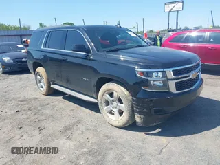 2017 Chevrolet Tahoe LT z VIN 1GNSCBKC2HR366799, wystawiony jako IAAI lot #41984432 z przebiegiem 158 918 mil mil oraz . Historia ofert i sprzedaży dostępna na DreamBid. Obrazek 1.