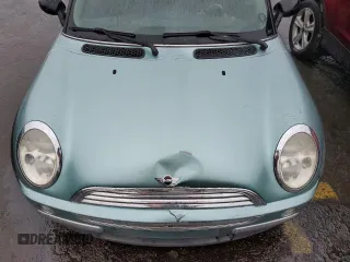 2002 MINI Hardtop with VIN WMWRC33482TC36332, listed as a Copart auction lot 42811115 with 203,708 mi miles and Salvage Title. Bid and sale history available at DreamBid. Image 11.