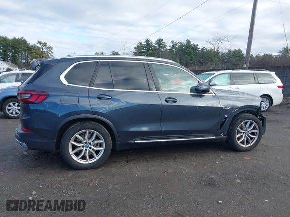 2022 BMW X5 xDrive45e with VIN 5UXTA6C05N9K75681, listed as a IAAI auction lot 40954930 with 13,463 mi miles. Bid and sale history available at carsss.com. Image 14.