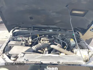 2008 Jeep Wrangler Unlimited Sahara with VIN 1J4GB59118L522013, listed as a IAAI auction lot 41644487 with 227,176 mi miles and . Bid and sale history available at DreamBid. Image 10.