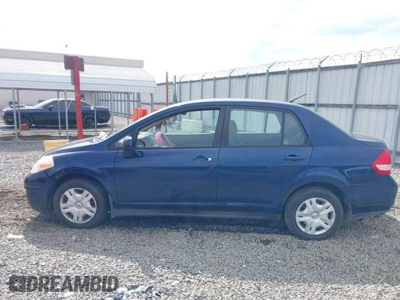 2011 Nissan Versa S with VIN 3N1BC1AP2BL408977, listed as a IAAI auction lot 42524102 with 195,285 mi miles and . Bid and sale history available at DreamBid. Image 14.