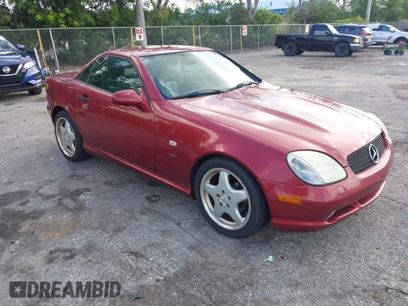 2000 Mercedes-Benz SLK 230 Kompressor with VIN WDBKK47F2YF146797, listed as a IAAI auction lot 42823113 with 35,881 mi miles and . Bid and sale history available at DreamBid. Image 1.