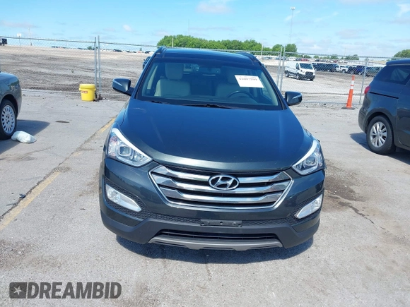 2014 Hyundai Santa Fe with VIN 5XYZUDLB0EG187984, listed as a IAAI auction lot 42607599 with 111,594 mi miles and . Bid and sale history available at DreamBid. Image 12.