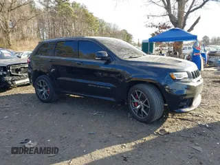 2017 Jeep Grand Cherokee SRT with VIN 1C4RJFDJ3HC694736, listed as a IAAI auction lot 41292771 with 79,966 mi miles. Bid and sale history available at carsss.com. Image 1.