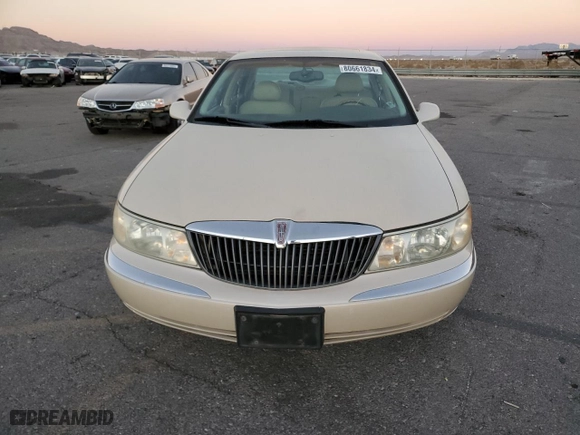 2000 Lincoln Continental with VIN 1LNHM97V0YY807253, listed as a Copart auction lot 80661834 with 130,398 mi miles and Salvage Title. Bid and sale history available at carsss.com. Image 5.